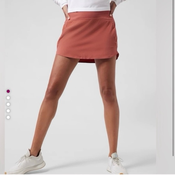 Athleta run with it 14 inch skort orange color size small - Picture 1 of 9